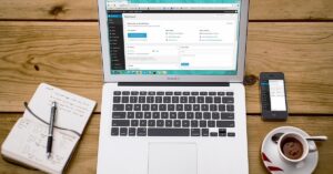 Laptop on the desk showing website layout tips