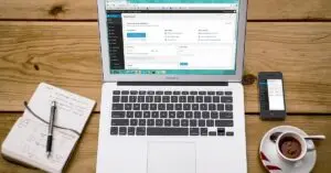 - brandyoucreative uk Laptop on the desk showing website layout tips